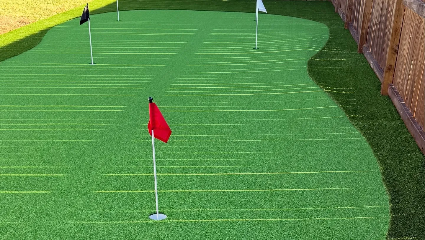 Commercial-scale synthetic turf installation with reinforced seams